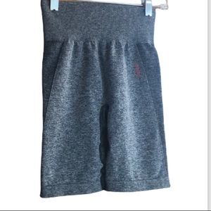 Gymshark gray long workout shorts with pink logo